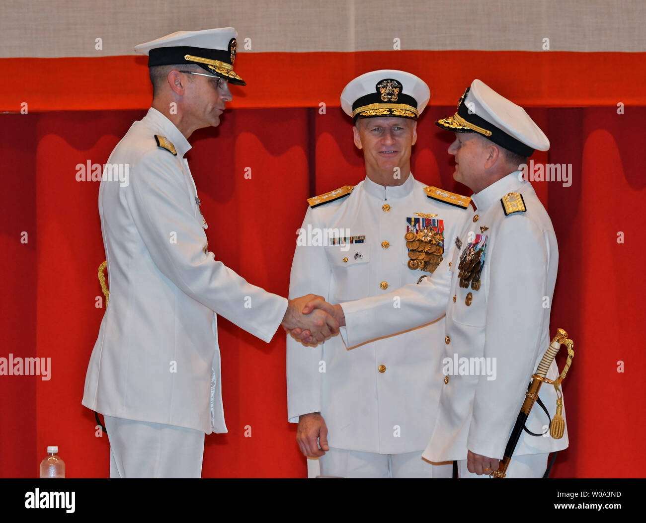 Rear Adm. Matthew J. Carter(L), commander, U.S. Naval Forces Japan ...