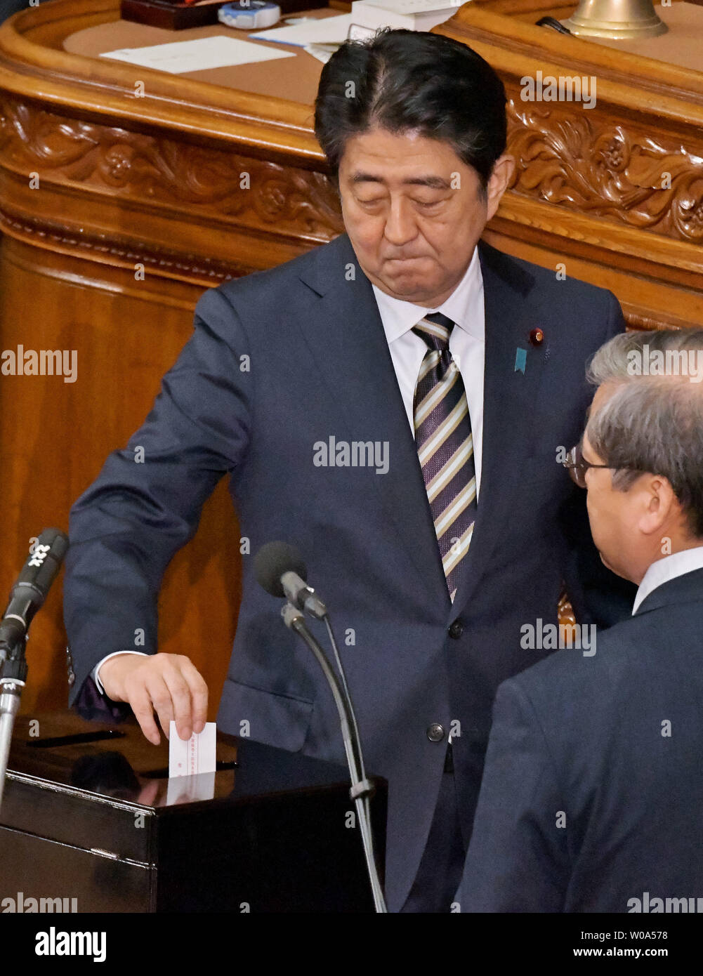 Shinzo Abe votes in a parliamentary election to choose the Prime Minister during an extraordinary session at the Lower House of the Parliament in Tokyo, Japan on November 1, 2017.     Photo by Keizo Mori/UPI Stock Photo