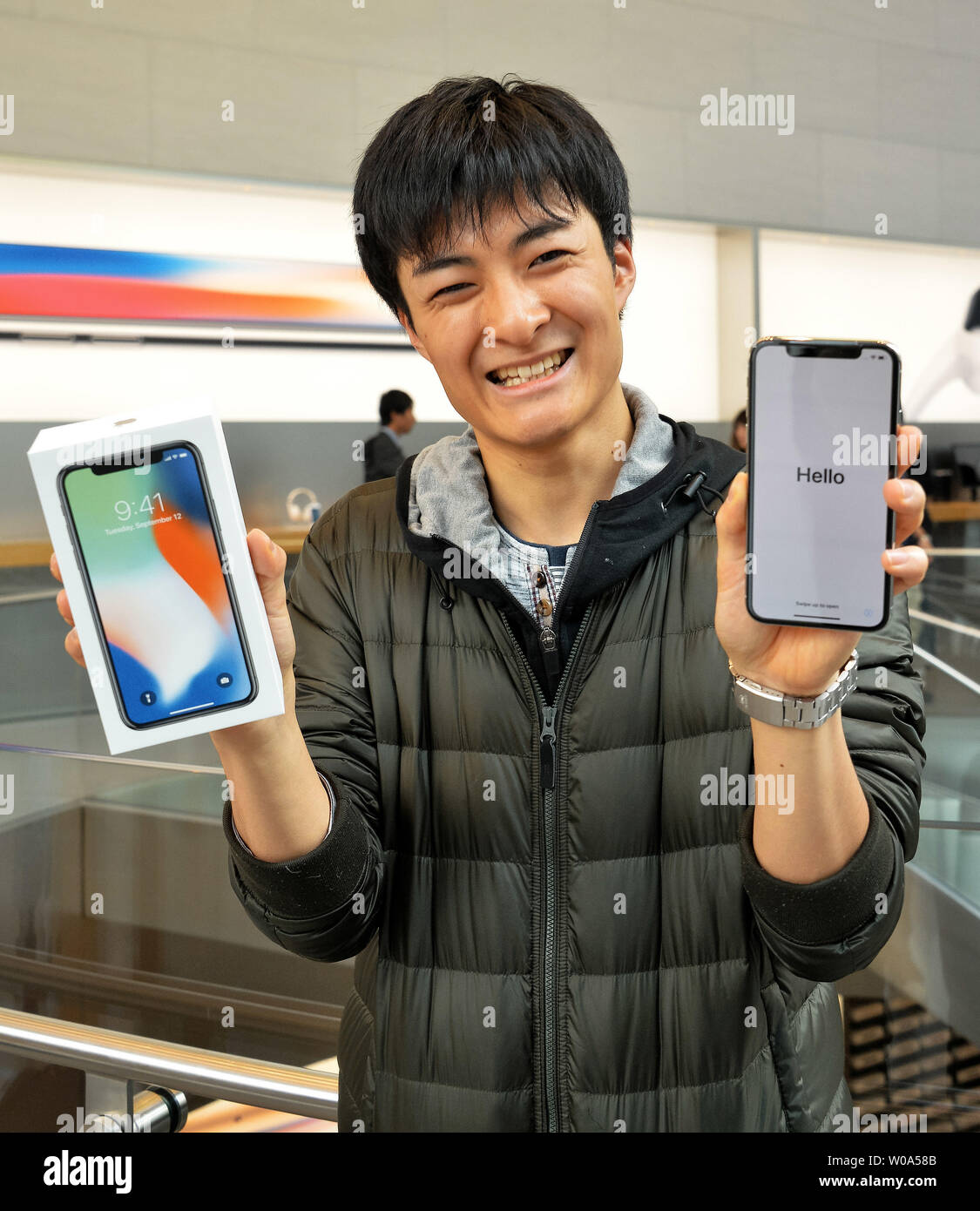 The first customer shows off his new Apple iPhone X at the Apple store  Omotesando in Tokyo, Japan on November 3, 2017. Photo by Keizo Mori/UPI  Stock Photo - Alamy
