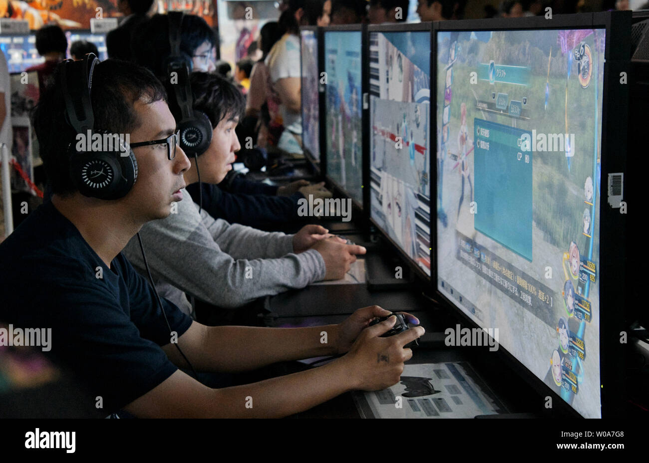 Visitors try out latest video game during the Tokyo Game Show 2018 at the Makuhari Messe in Chiba-prefecture, Japan on September 22, 2018. This event hosts 668 companies from 41 different countries, introducing 1568 game titles. Photo by Keizo Mori/UPI Stock Photo
