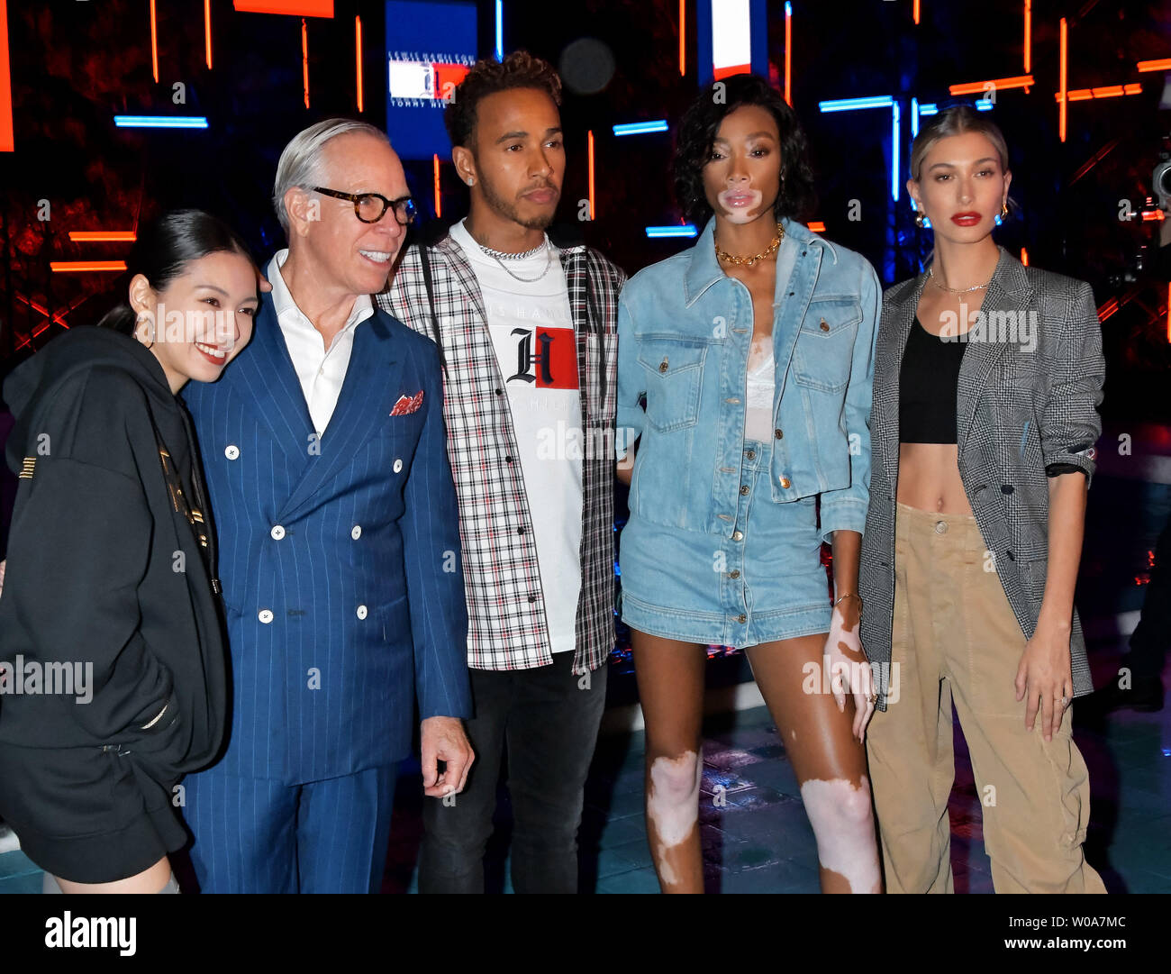 L-R)Japanese actress Fumi Nikaido, fashion designer Tommy Hilfiger, racing  driver Lewis Hamilton, model Winnie Harlow and Hailey Baldwin attend the  event "Tommy Hilfiger Presents Tokyo Icons" in Tokyo, Japan on October 8,