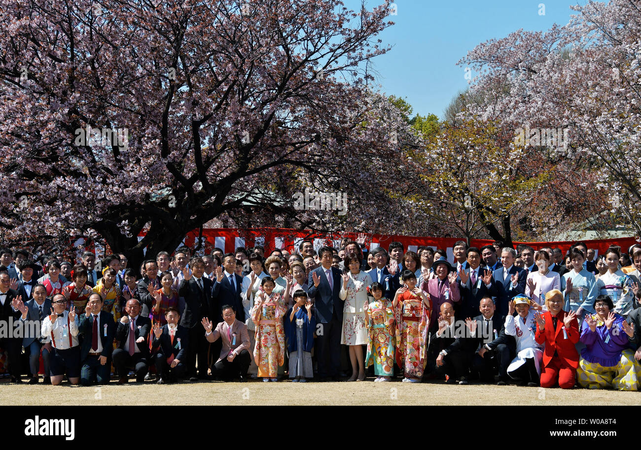 Japans Prime Minister Shinzo Abe And His Wife Akie Pose With Guests