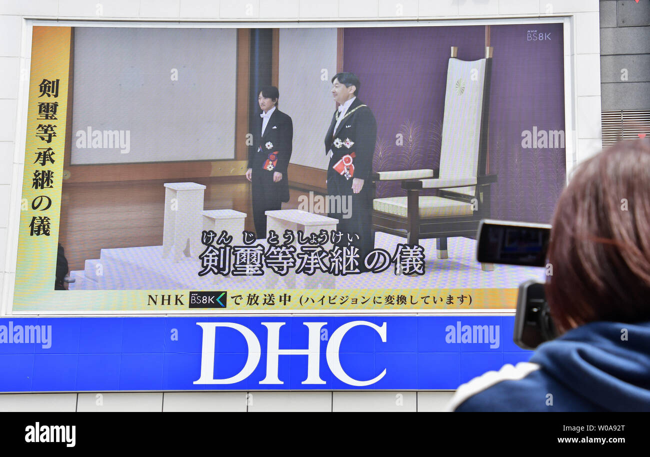 People Watch A Live Broadcast For New Emperor Naruhito Enthronement Ceremony On The Screen Near The Shinjuku Station In Tokyo Japan On May 1 19 Photo By Keizo Mori Upi Stock Photo Alamy