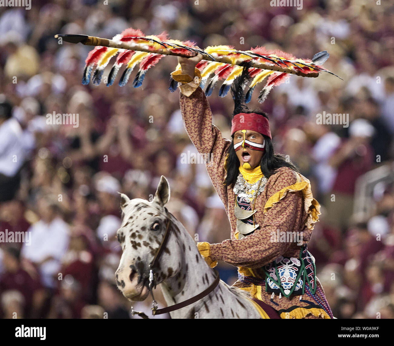 Florida State Seminoles mascot Osceola atop Renegade rally the fans against  Oklahoma in the 1st half of their NCAA football game in Tallahassee, Florida Sept 17, 2011.  The Oklahoma Sooners defeated the Florida State Sminoles 23-13.  UPI/Mark Wallheiser Stock Photo
