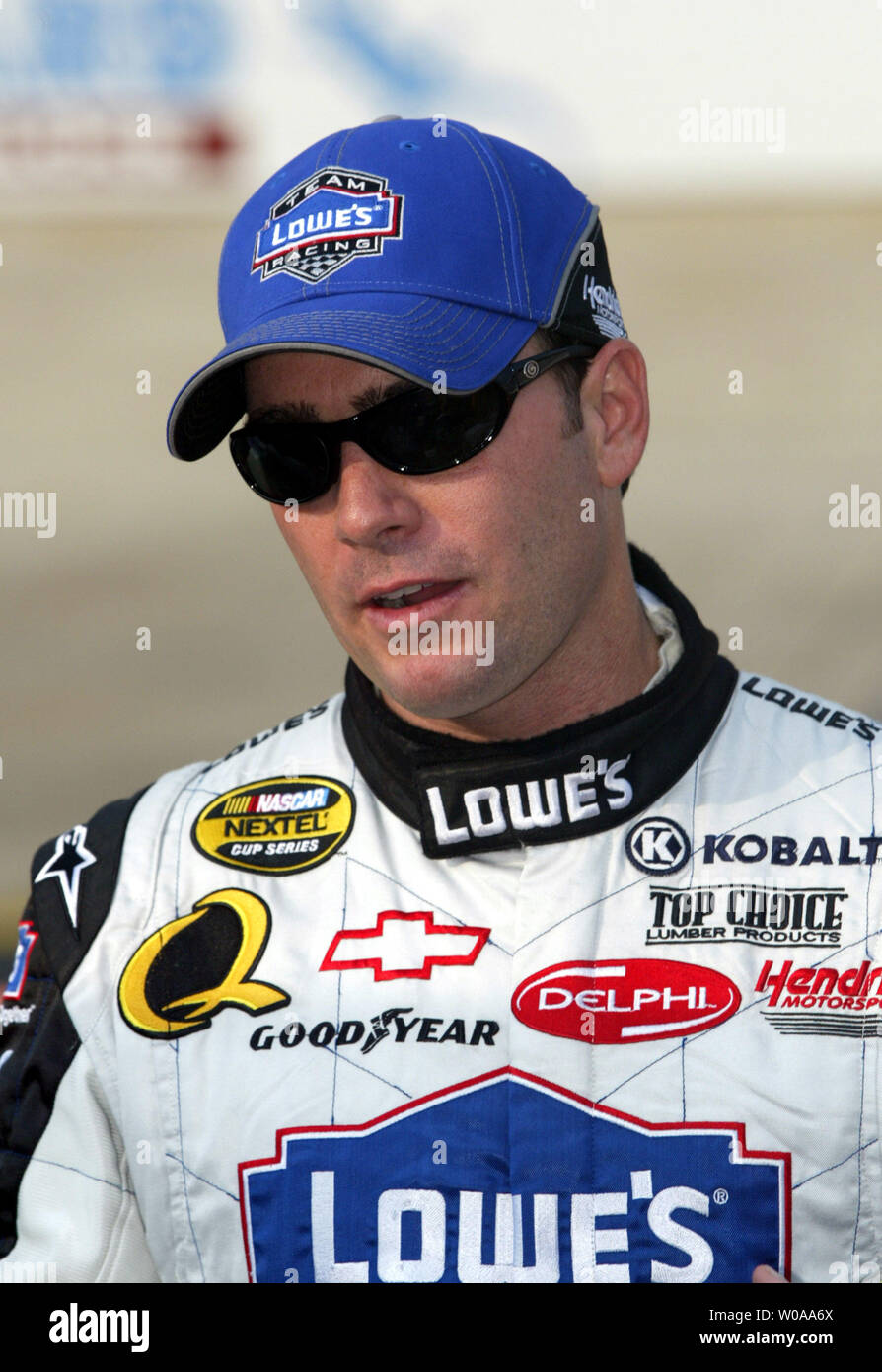 NASCAR race car driver Jimmie Johnson stands on pit road before the final practice session for