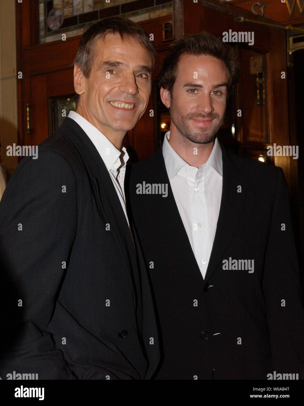 Joseph Fiennes(right) and Jeremy Irons pose for photographers on the red carpet before the Toronto International Film Festival screening of 'The Merchant of Venice' at the Elgin Theater September 11, 2004  in Toronto, Canada. (UPI Photo/Christine Chew) Stock Photo