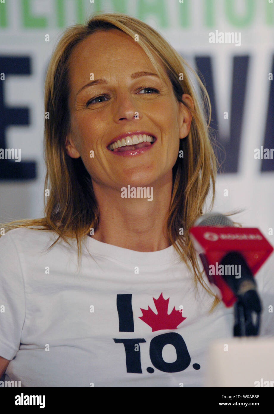 https://c8.alamy.com/comp/W0AB8F/helen-hunt-answers-questions-from-the-media-at-the-press-conference-for-a-good-woman-at-the-four-seasons-hotel-during-the-toronto-international-film-festival-september-16-2004-in-toronto-canada-hunt-endeared-herself-to-local-media-as-she-sported-a-t-shirt-with-i-love-to-on-it-to-is-the-nickname-torontonians-call-their-city-upi-photochristine-chew-W0AB8F.jpg