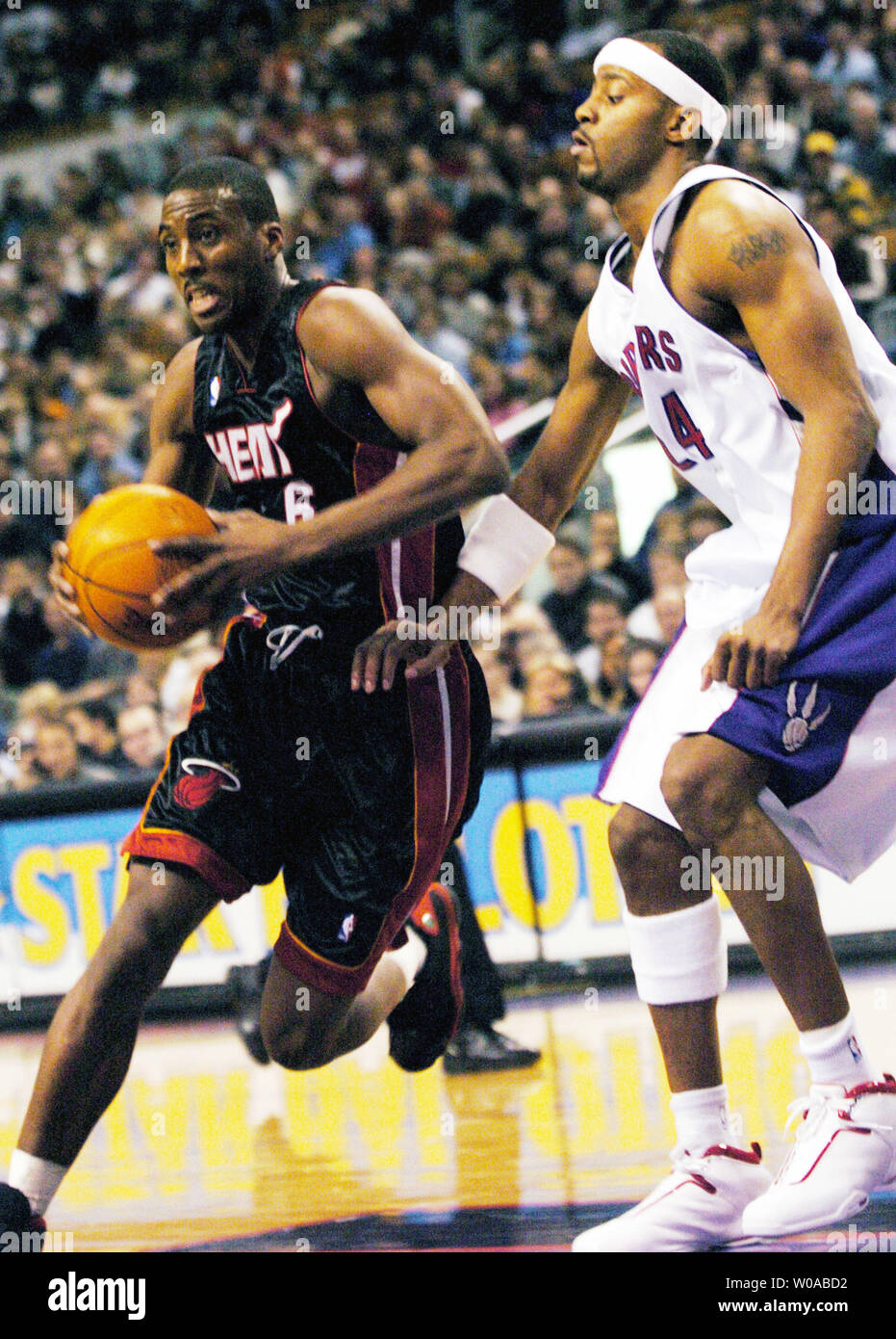 Toronto Raptors' Morris Peterson guards Atlanta Hawks' Joe Johnson in the  first quarter as the Raptors host the Hawks at the Air Canada Center on  December 28, 2005 in Toronto, Canada. Peterson