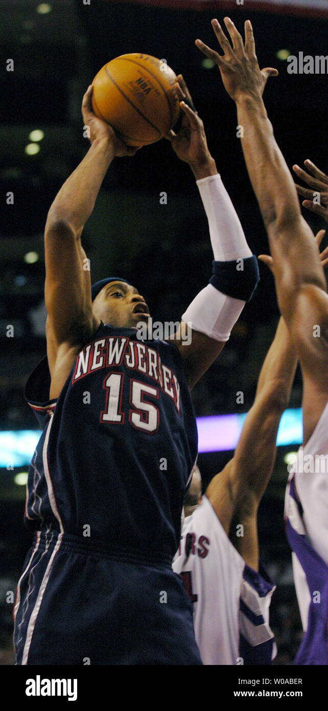 New Jersey Nets' Vince Carter tries to encourage his team after the Nets  fall 14 points behind the Toronto Raptors at the half at the Air Canada  Center April 15, 2005 in