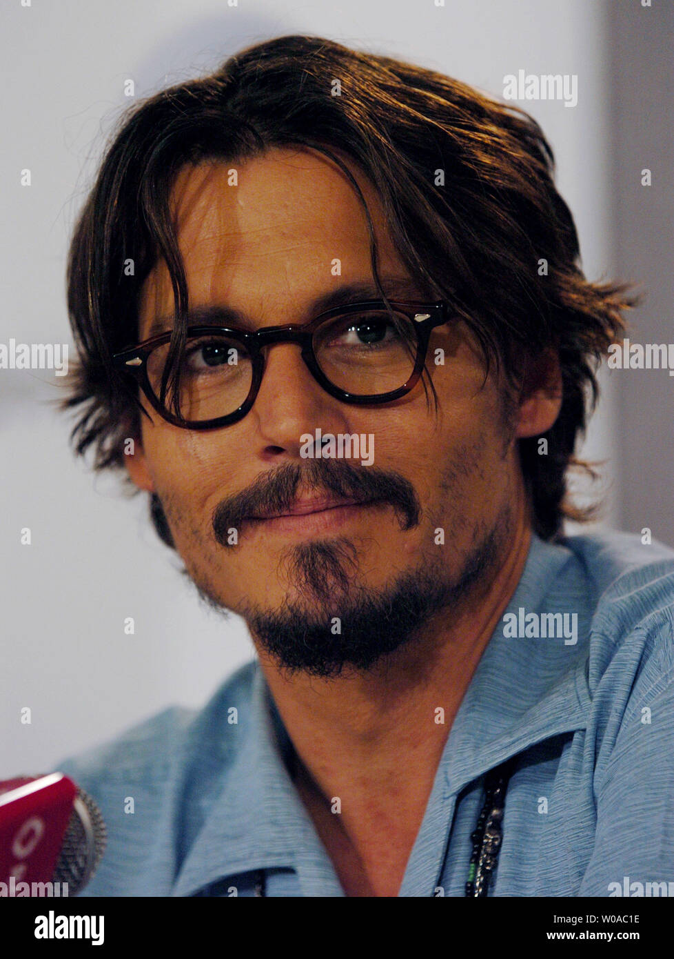 Johnny Depp listens to questions from the media at a press conference for Tim Burton's 'Corpse Bride' at the Sutton Place Hotel during the Toronto International Film Festival on September 10, 2005 in Toronto, Canada. (UPI Photo/Christine Chew) Stock Photo