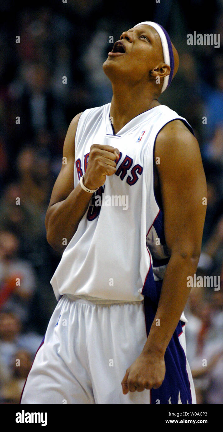 NBA Eastern Conference Rookie of the Month(December) Charlie Villanueva of the Toronto Raptors rallies the fans as the Raptors surge to a lead late in fourth quarter action against the New Jersey Nets at the Air Canada Center on January 8, 2006 in Toronto, Canada. The Raptors could not hold onto the lead and eventually lost 104-105 as the Nets' Vince Carter made a three-pointer with 0.1 seconds remaining in the game. (UPI Photo/Christine Chew) Stock Photo