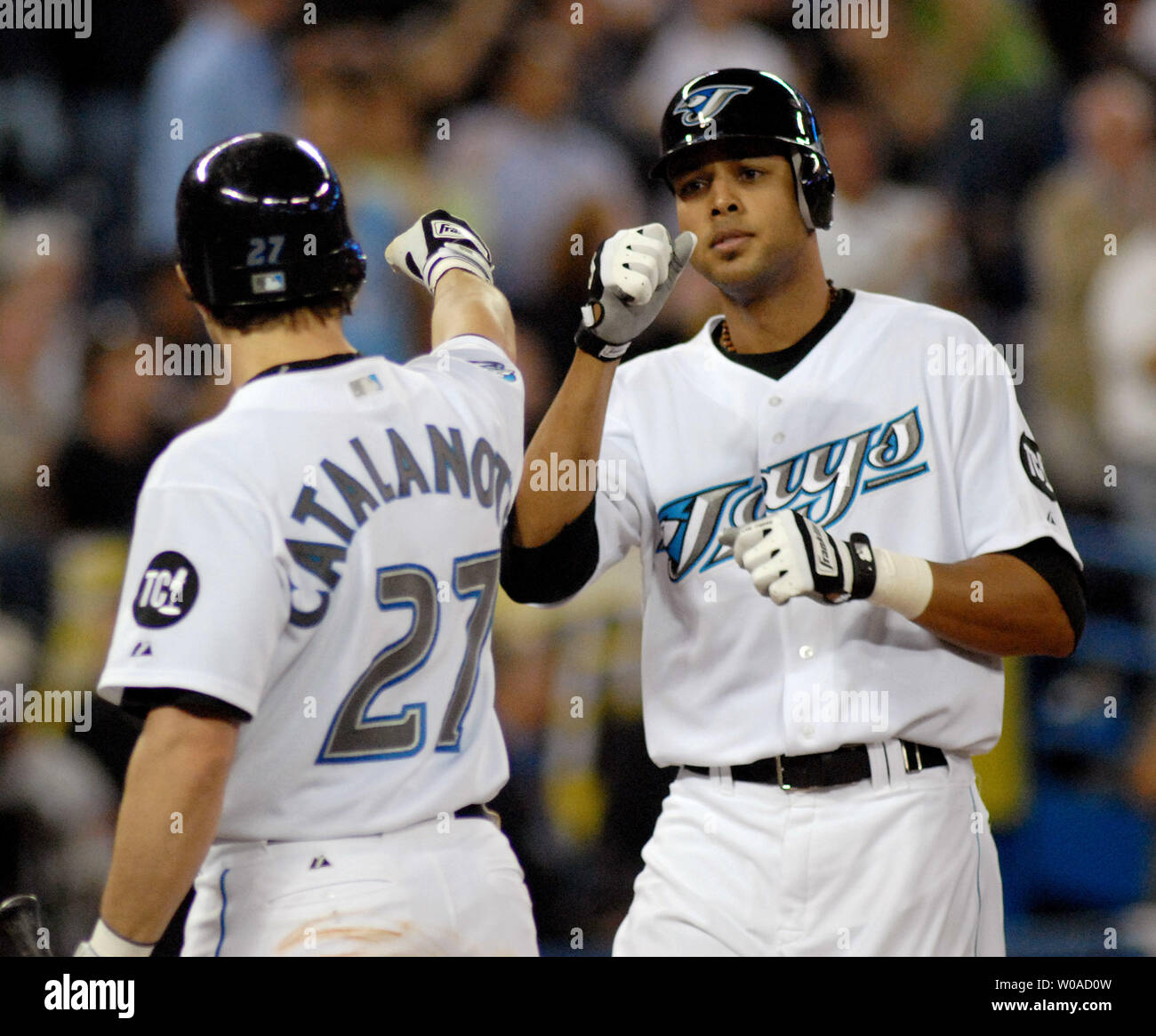 Toronto Rios Toronto Blue Jays' Alex Rios and Frank Catalanotto celebrate at home ...