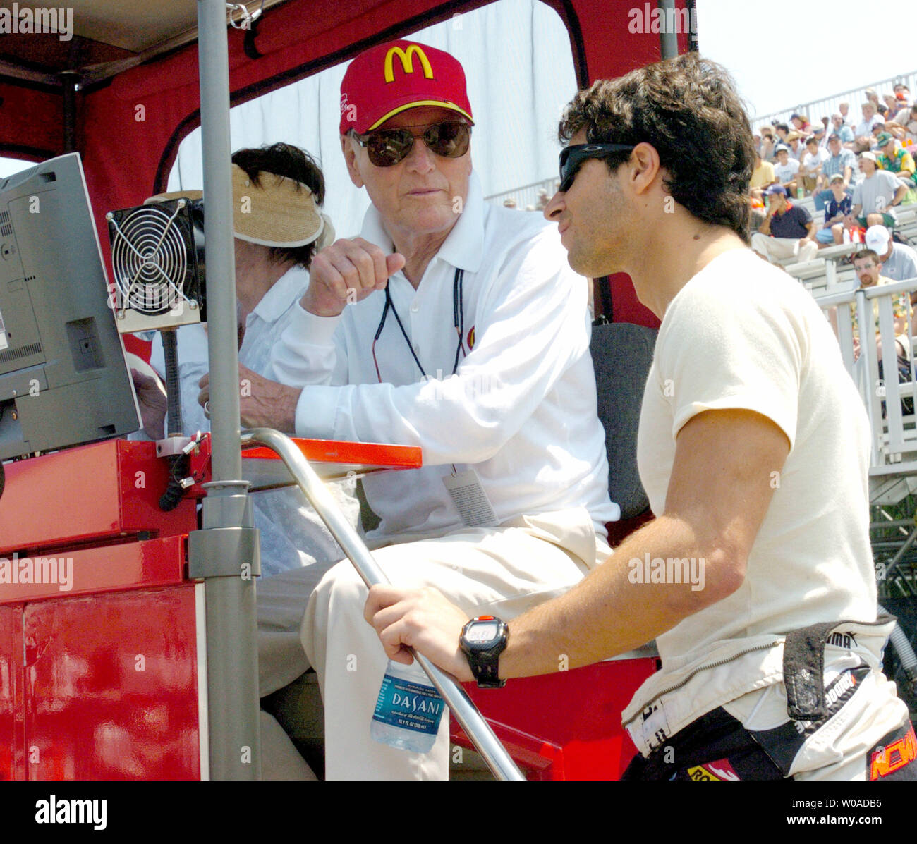 Actor and Newman-Haas Racing team owner Paul Newman chats with Bruno ...