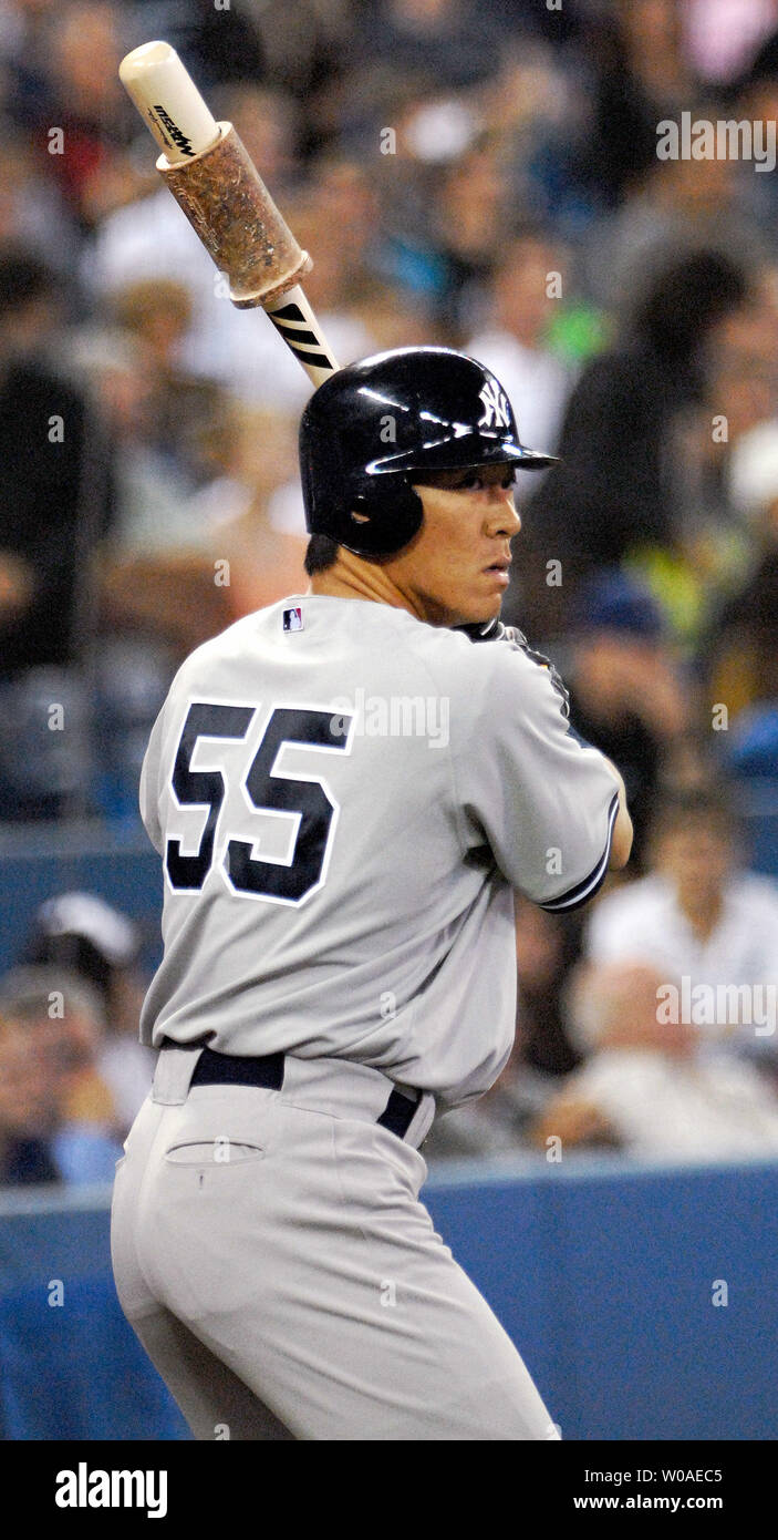 New York Yankees' Hideki Matsui warms up in the on-deck circle in the  fourth inning as the Toronto Blue Jays host the Yankees in the first game  of a 3-game series at