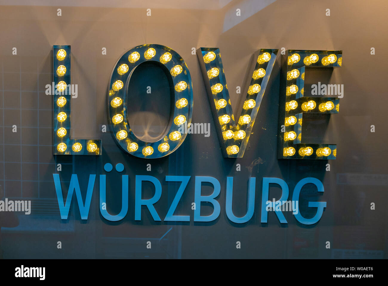 WURZBURG, GERMANY - JUNE 12, 2019: advertising slogan in a showcase of the city Stock Photo