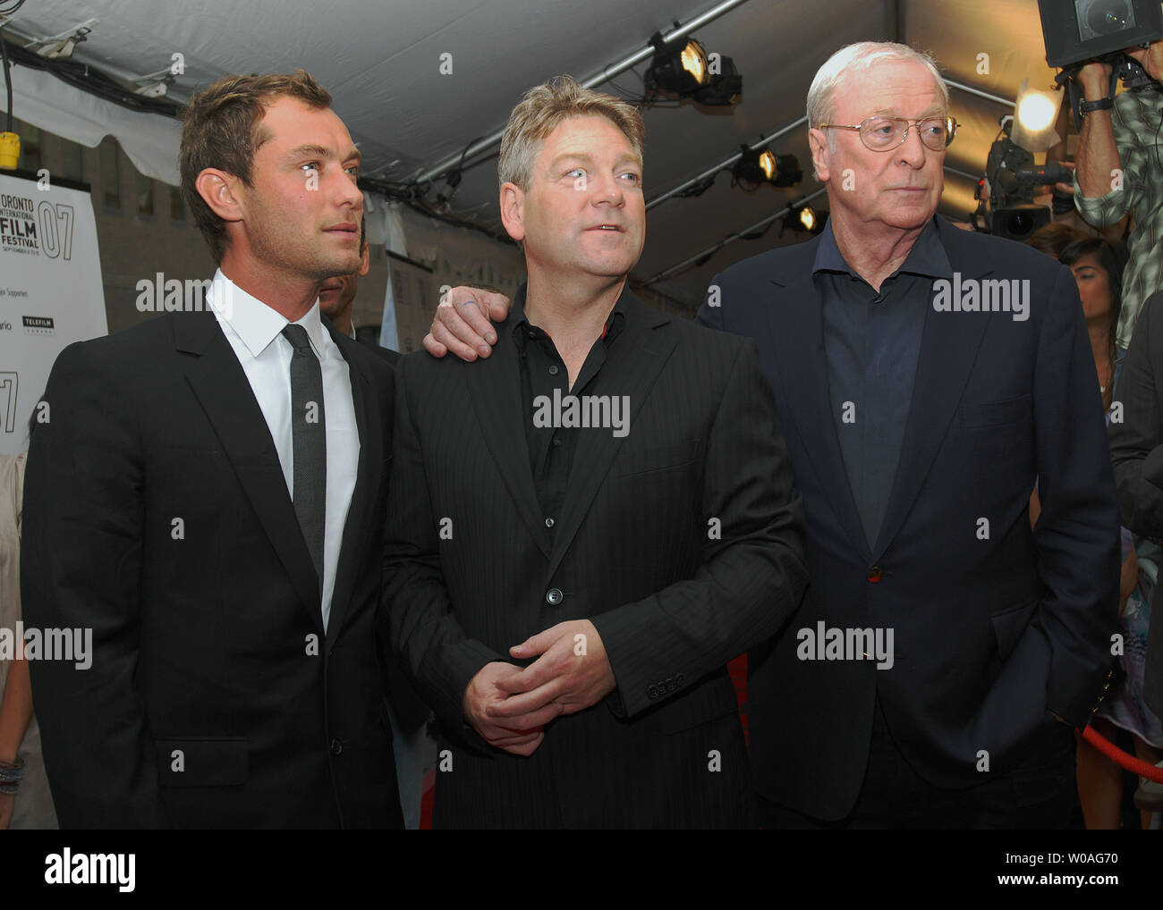 (L-R) Jude Law, director Kenneth Branagh and Michael Caine arrive for ...