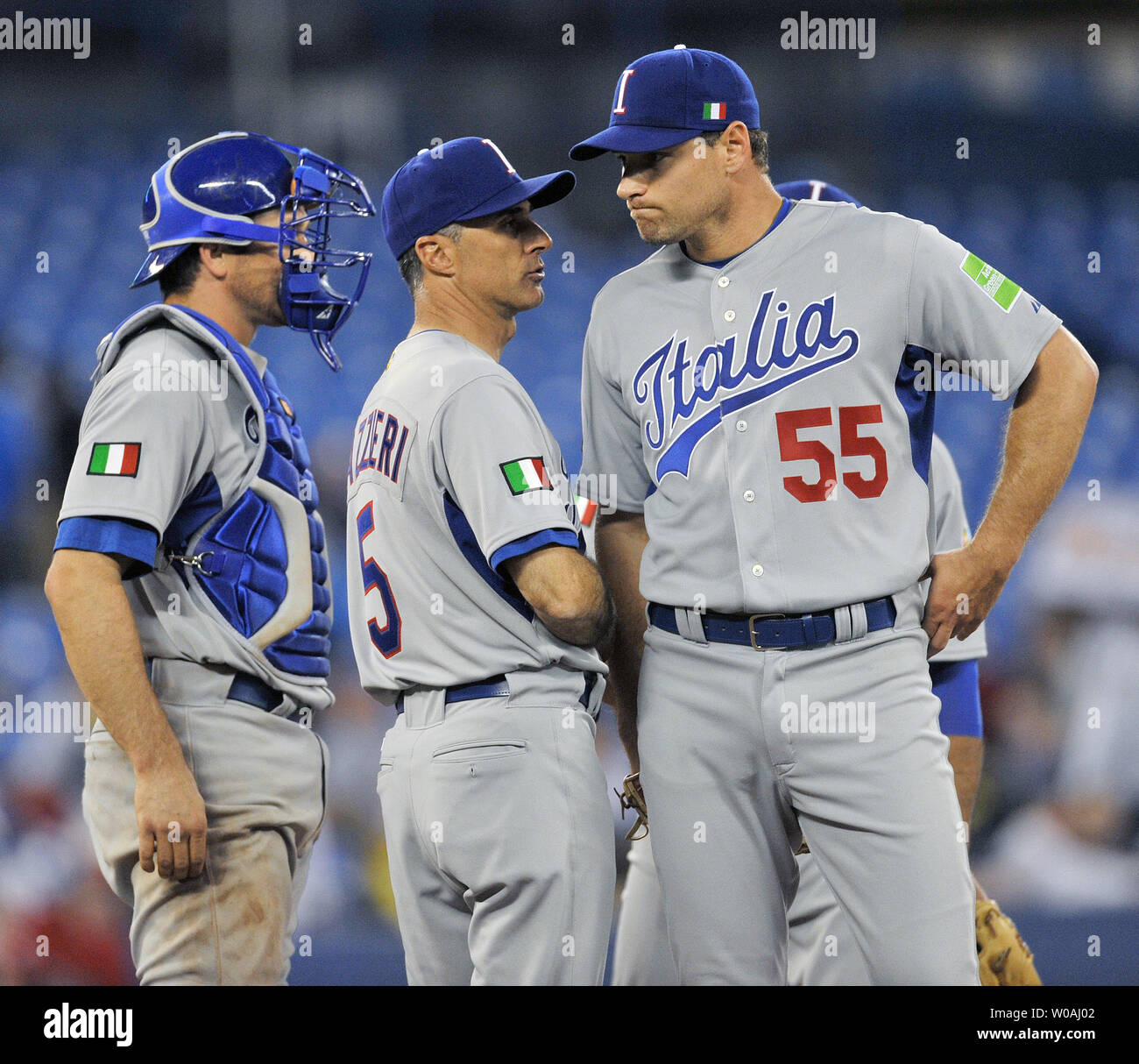 L-R) Team USA's Kevin Youkilis, Derek Jeter and Dustin Pedroia