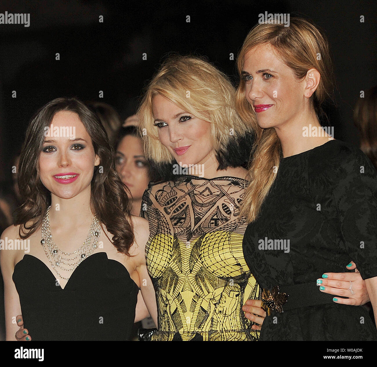 (L-R) Ellen Page, Drew Barrymore and Kristen Wiig arrive for the world premiere of Barrymore's directorial debut 'Whip It' at the Ryerson Theater during the Toronto International Film Festival in Toronto, Canada on September 13, 2009.  UPI /Christine Chew Stock Photo