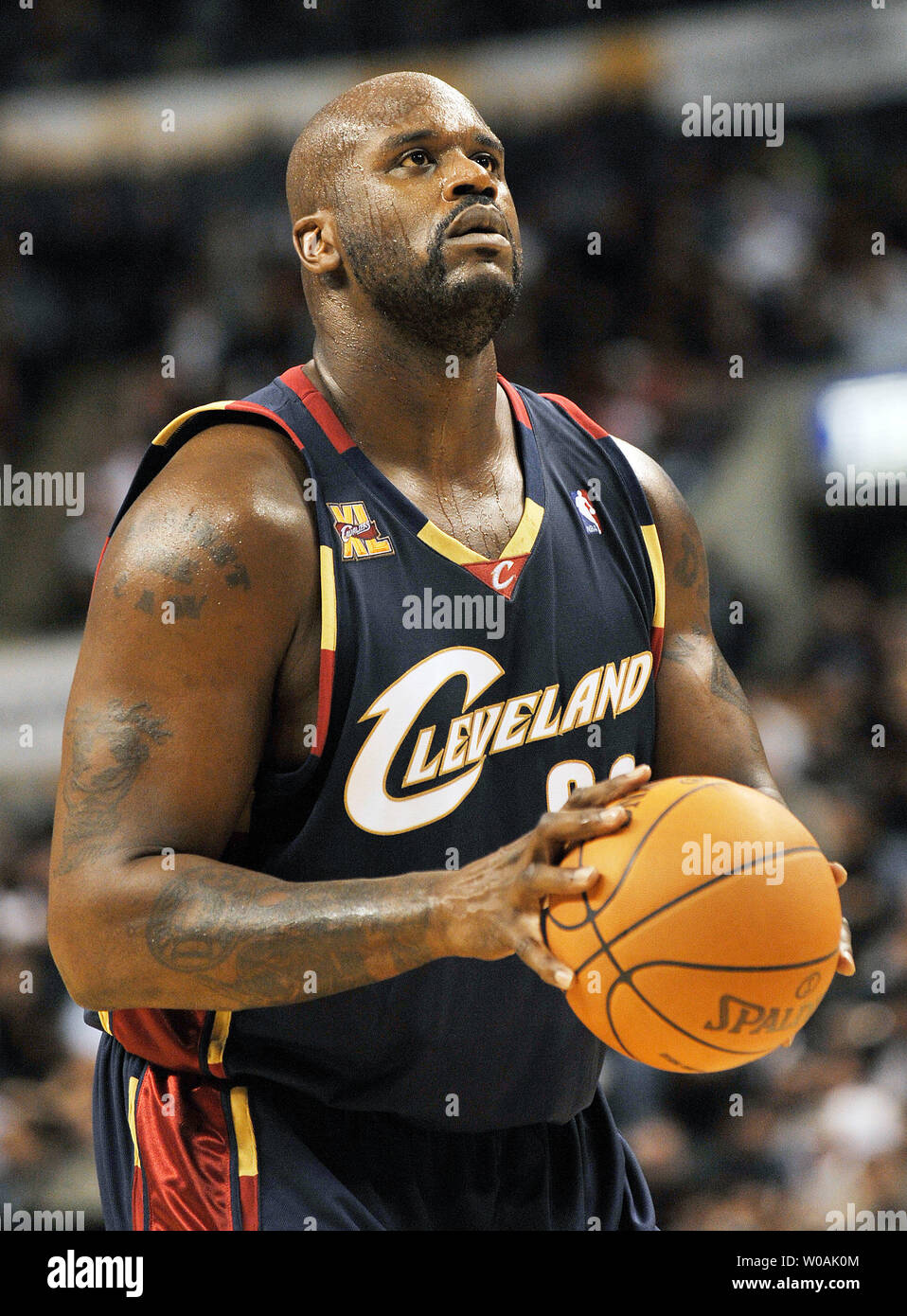 Cleveland Cavaliers' Shaquille O'Neal prepares to take a free throw in  second quarter action of the Toronto Raptors' home opener against his team  at the Air Canada Center in Toronto, Canada on