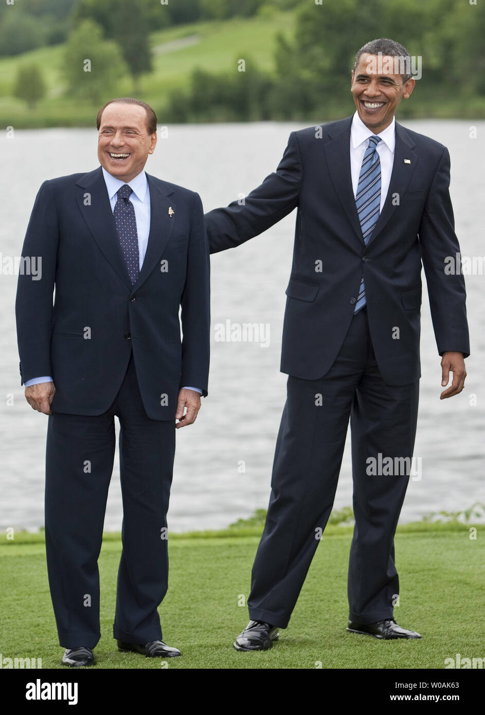 United States President Barack Obama (R) shares a laugh with Italian