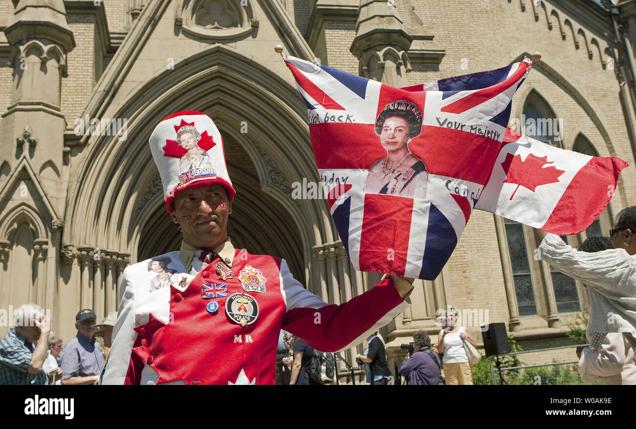 Toros Djerdjeian shows his support for the monarchy as Great Britain's Queen Elizabeth and Prince Philip arrive for Sunday morning mass at St. James Cathedral in Toronto, Ontario, July 4, 2010. The Queen and Prince Philip are on day seven of their nine day Royal Tour of Canada.  UPI/Heinz Ruckemann Stock Photo
