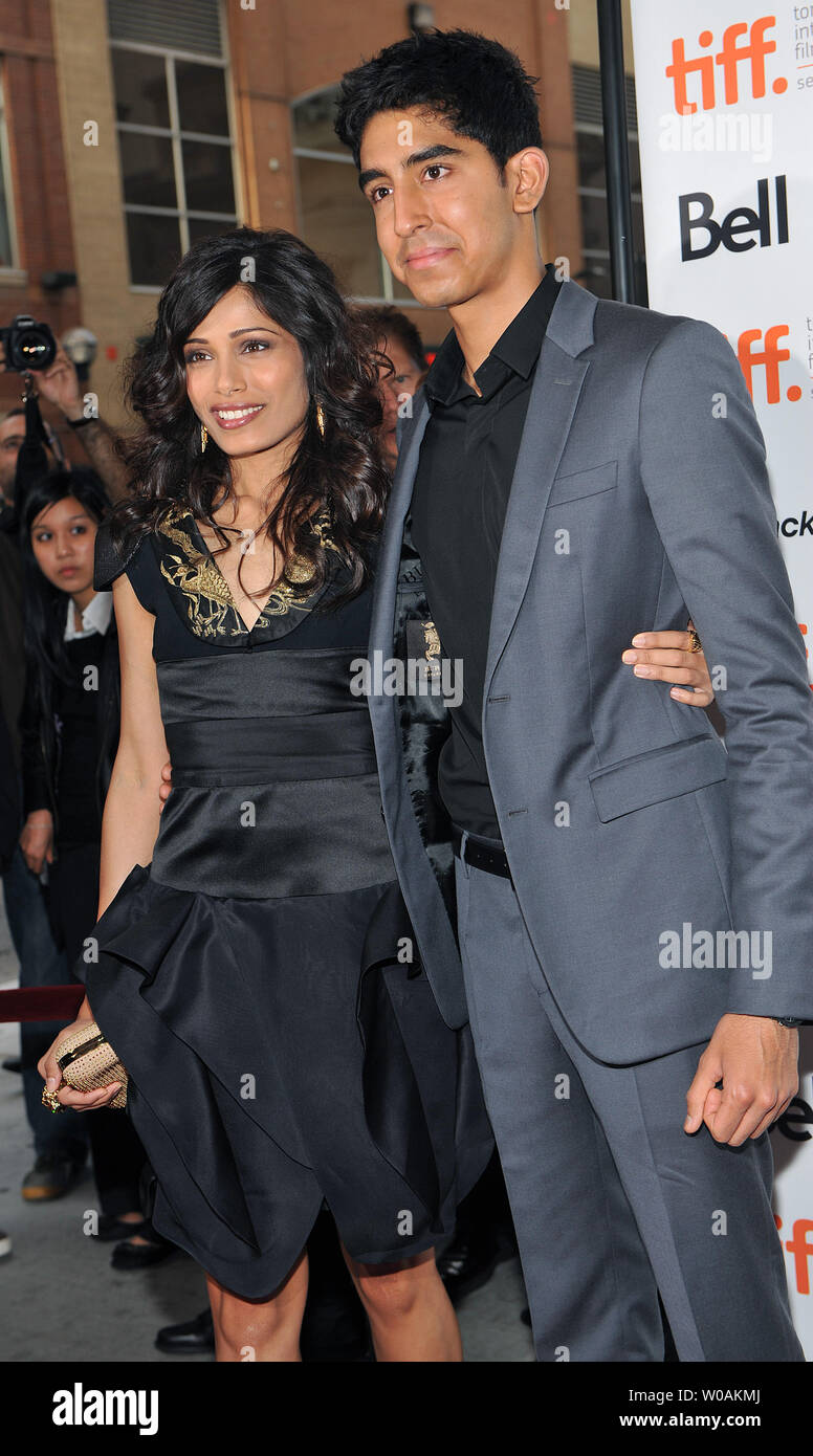 Actors Freida Pinto L And Dev Patel Arrive For The Toronto International Film Festival Premiere Of You Will Meet A Tall Dark Stranger At The Elgin Theater In Toronto Canada On September