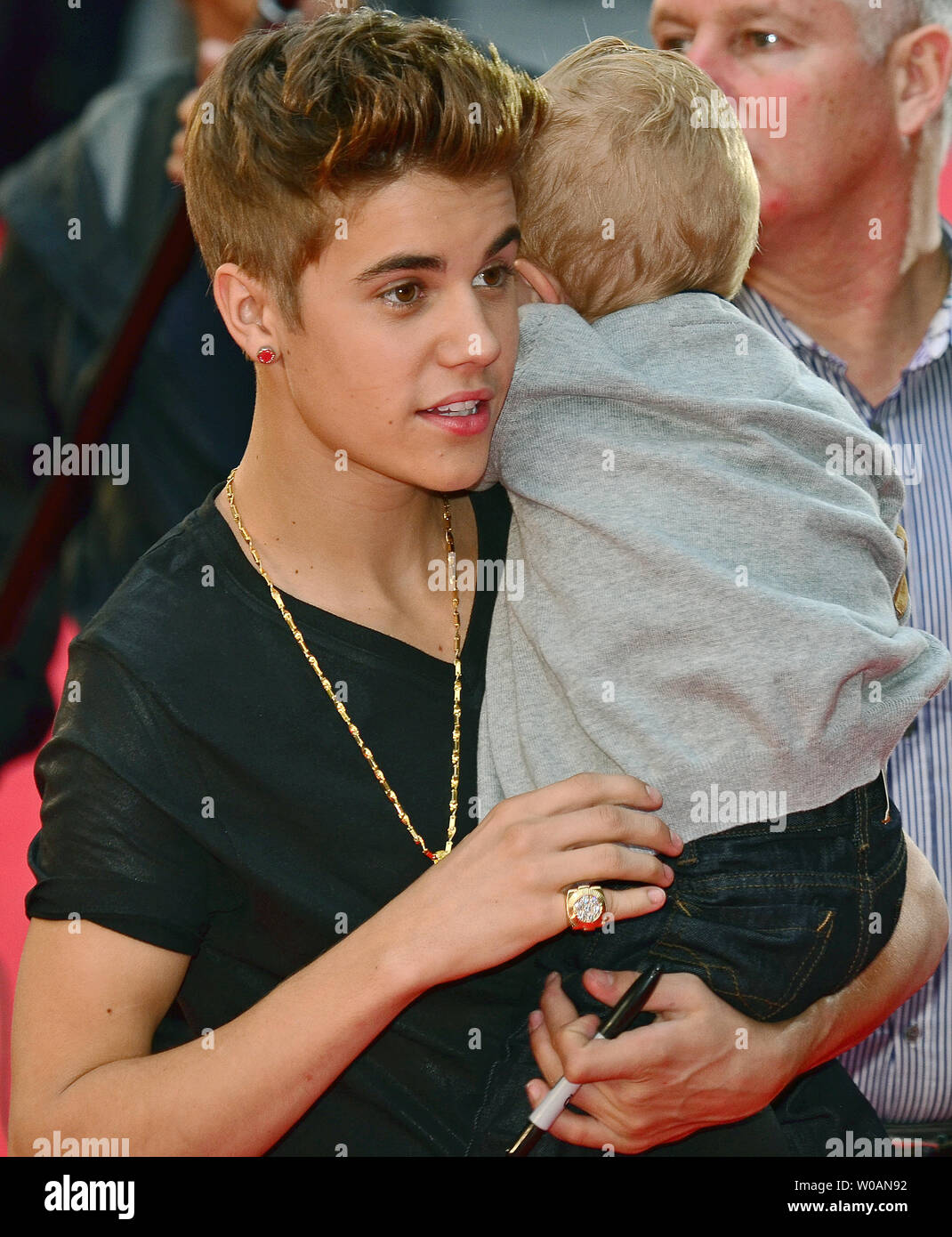 Justin Bieber Holds His Baby Brother Jaxon As He Arrives On The Red Carpet At The Muchmusic Video Awards In Toronto Canada On June 17 2012 Upi Christine Chew Stock Photo Alamy