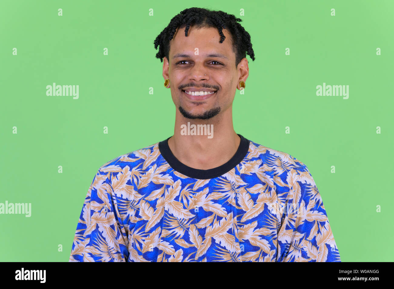 Face of happy young handsome African man thinking Stock Photo - Alamy