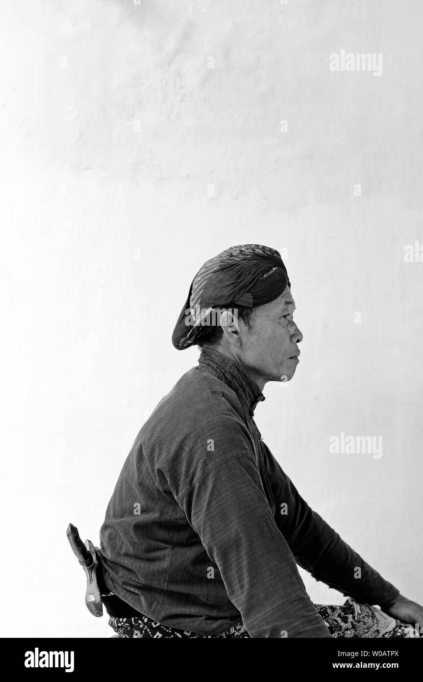 yogyakarta, indonesia - 2009.04.27: a courtly servant / abdi dalem at the kraton Stock Photo