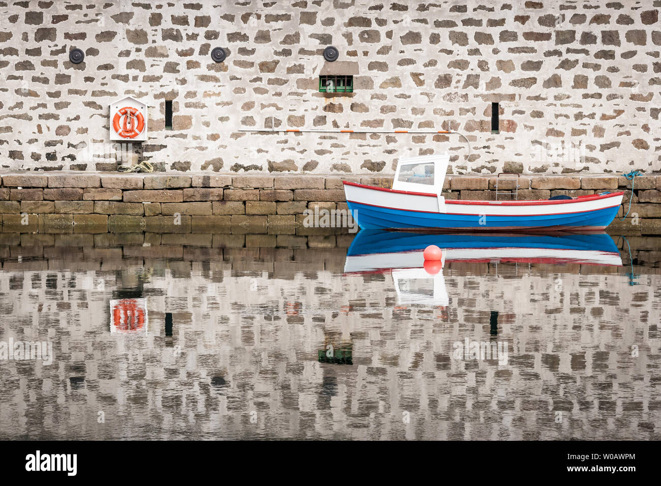 Boat reflections at Hay's Dock in Lerwick in the Shetland Isles, North of Scotland, UK. Stock Photo