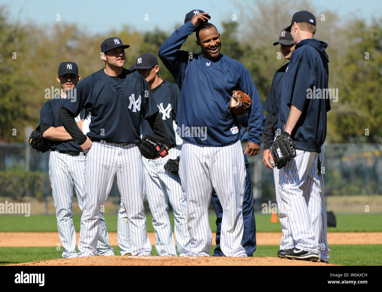 New York Yankees' pitcher CC Sabathia shares a laugh with other pitchers  during Yankees spring training at Steinbrenner Field in Tampa, Florida on  February 17, 2009. (UPI Photo/Kevin Dietsch Stock Photo - Alamy