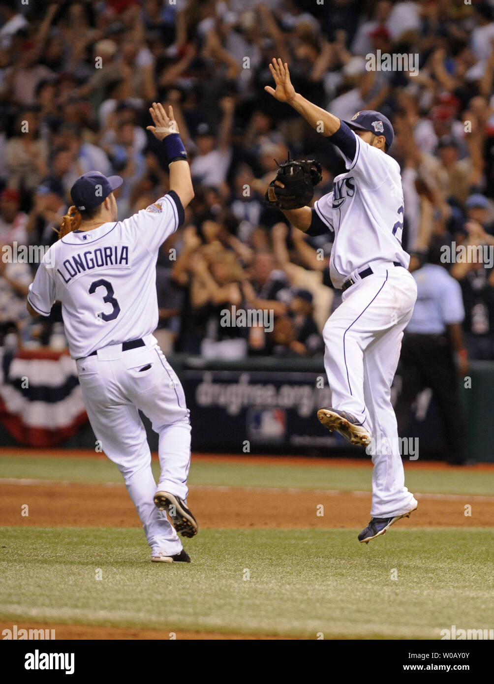 Tampa Bay Rays first baseman Carlos Pena (R) and Evan Longoria celebrate after defeating the Philadelphia Phillies 4-2 to win game two of the World Series at Tropicana Field in St. Petersburg, Florida on October 23, 2008.  (UPI Photo/Kevin Dietsch) Stock Photo