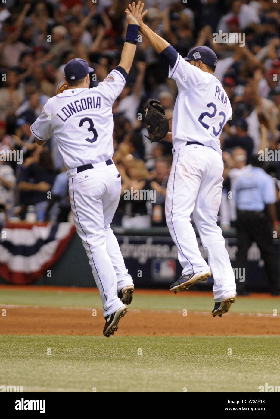 Tampa Bay Rays first baseman Carlos Pena (23) and Evan Longoria celebrate after defeating the Philadelphia Phillies 4-2 to win game two of the World Series at Tropicana Field in St. Petersburg, Florida on October 23, 2008.  (UPI Photo/Kevin Dietsch) Stock Photo