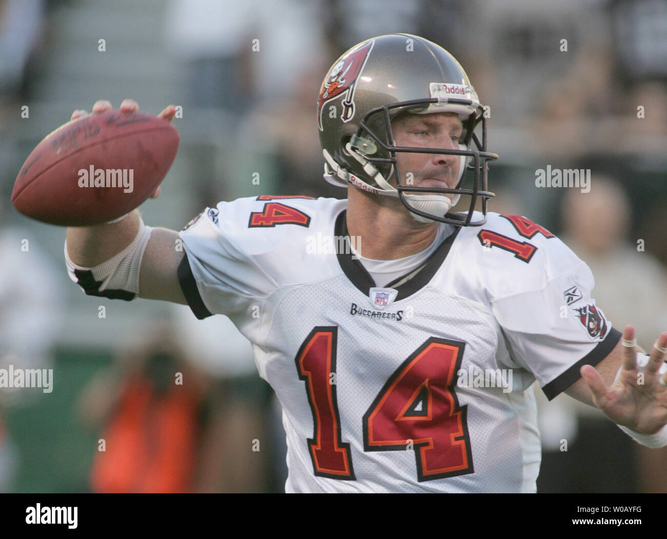 Dec. 9, 2012 - Tampa, Florida, U.S. - Tampa Bay Buccaneers 2002 Superbowl  team QB Brad Johnson gets a high five from the Bucs mascot as he runs onto  the field as