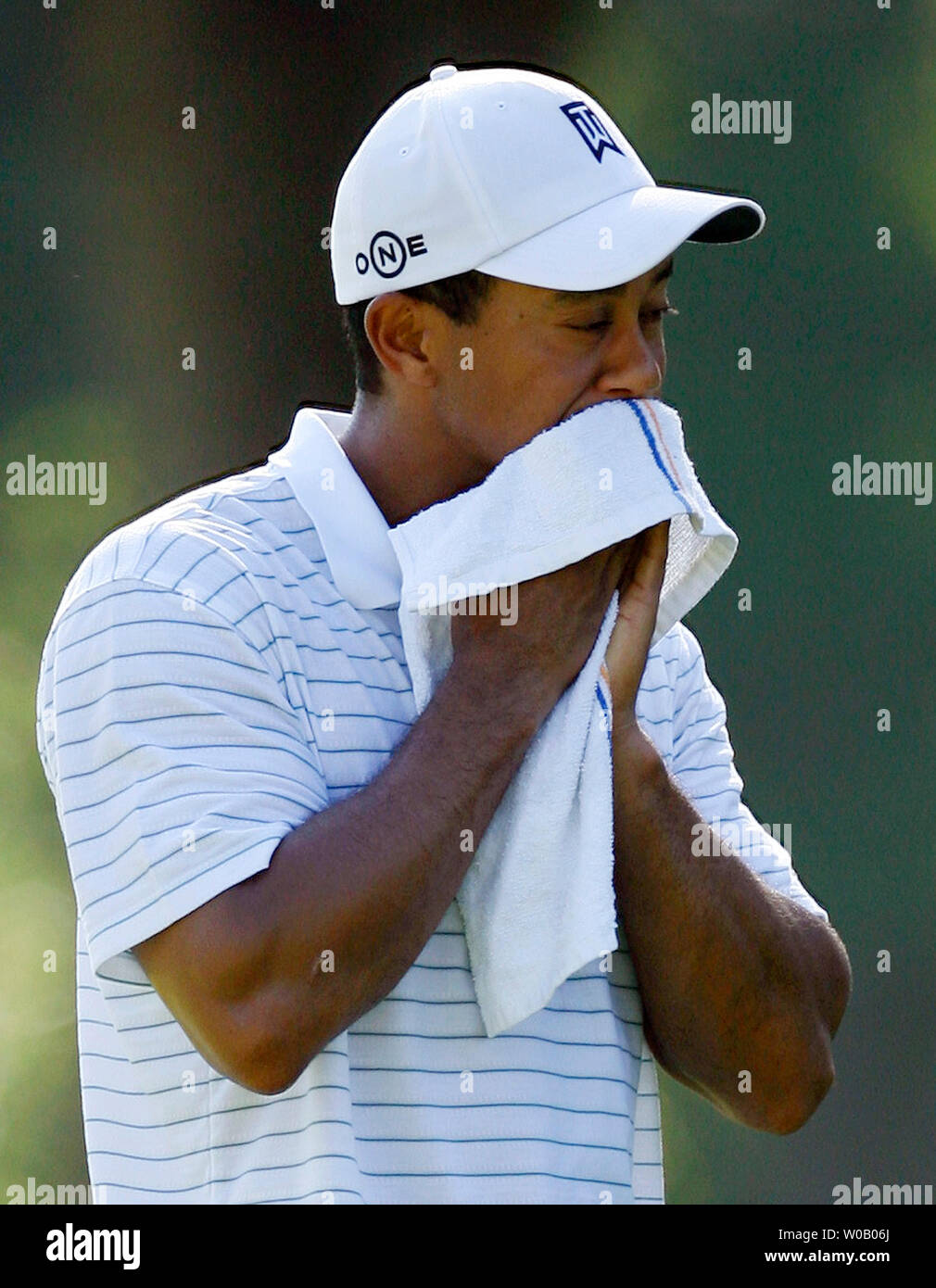 Tiger Woods towels off in the first round as the heat builds during the 89th PGA Championship at Southern Hills Country Club in Tulsa, Oklahoma on August 9, 2007.   (UPI Photo/Gary C. Caskey Stock Photo