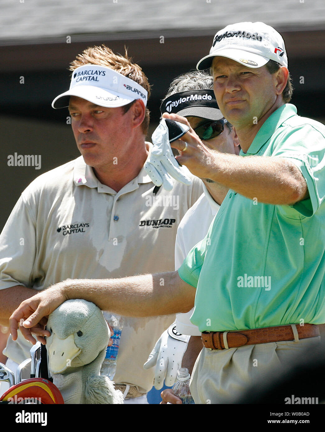 South Africa's Retief Goosen (R) looks down the fairway on the first hole with Northern Ireland's Darren Clarke standing by as play sets to begin in the second  round of the 89th PGA Championship at Southern Hills Country Club in Tulsa, Oklahoma on August 10, 2007.   (UPI Photo/Gary C. Caskey) Stock Photo