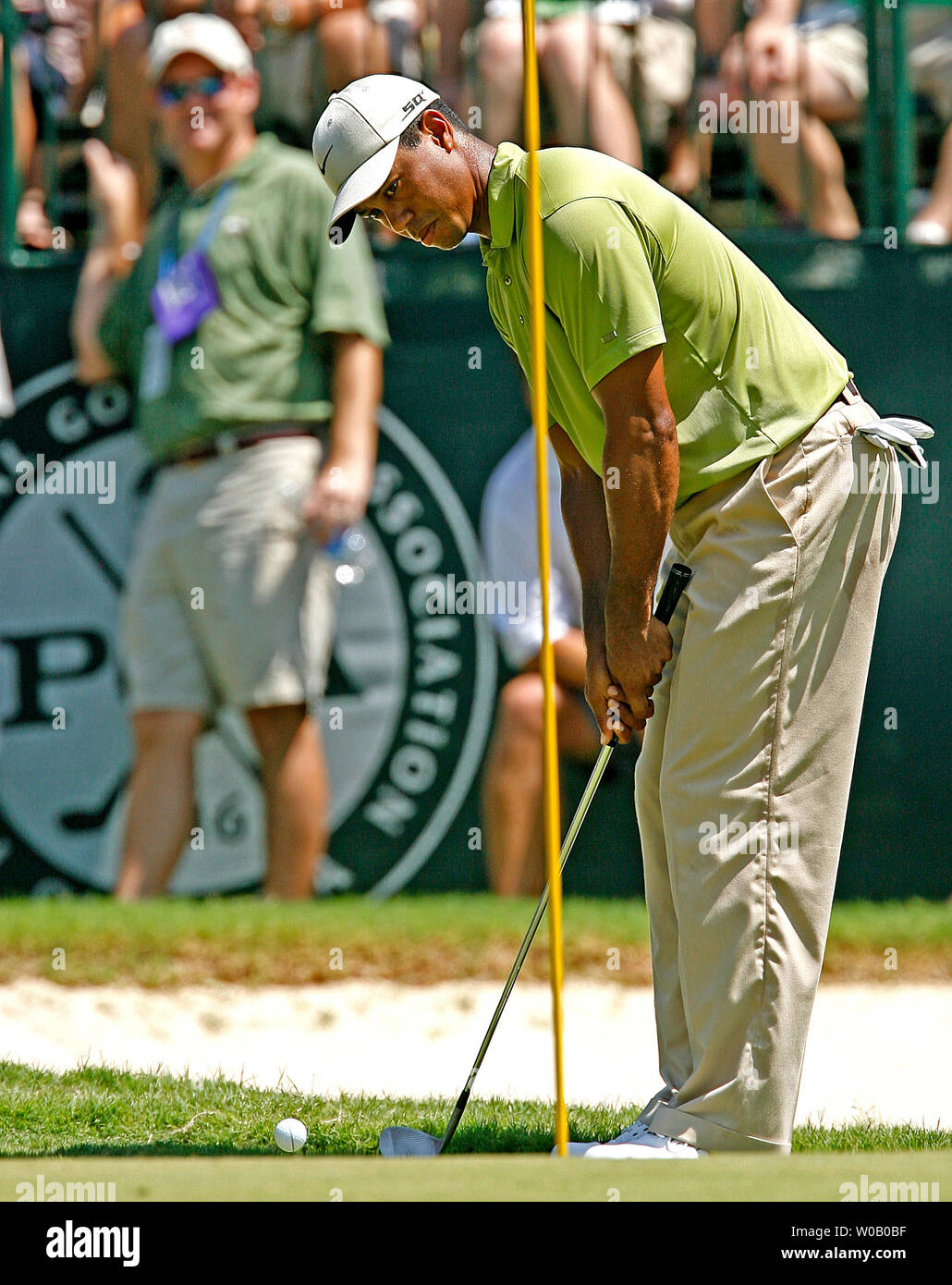 Leader Tiger Woods chips from the fringe onto the third green during the third round of the 89th PGA Championship at Southern Hills Country Club in Tulsa, Oklahoma on August 11, 2007.   (UPI Photo/Gary C. Caskey) Stock Photo