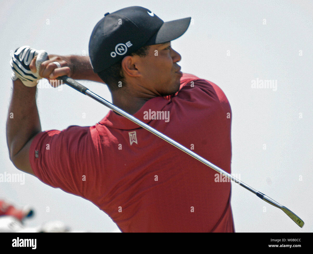 Leader Tiger Woods watches his two iron drive on the first hole during the final round of the 89th PGA Championship at Southern Hills Country Club in Tulsa, Oklahoma on August 12, 2007.  Woods starts the final round with a three shot lead at seven under par.  (UPI Photo/Gary C. Caskey) Stock Photo