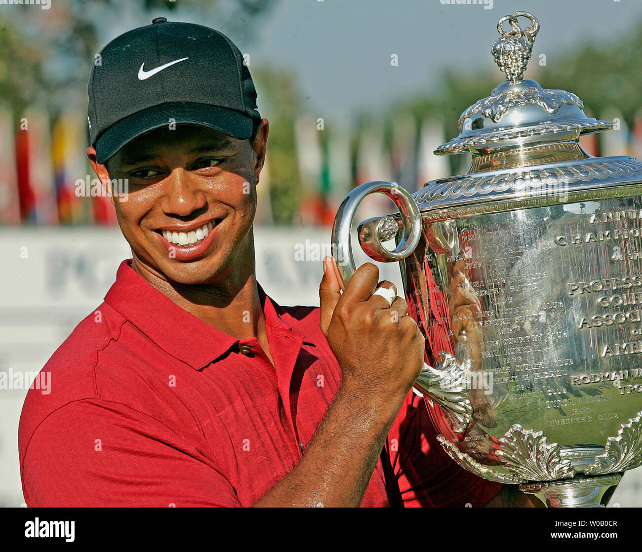 Tiger Woods holds the Wanamaker trophy after winning the 89th PGA Championship at Southern Hills Country Club in Tulsa, Oklahoma on August 12, 2007. Tiger Woods earned his 13th major winning the PGA with a eight under par 272. (UPI Photo/Gary C. Caskey) Stock Photo
