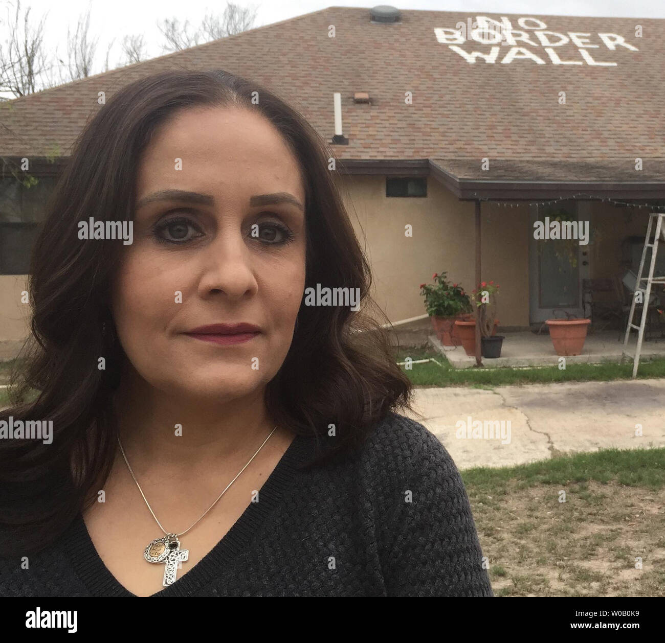 Nayda Alvarez stands in front of her home in Rio Grande City, Texas on March 5, 2019. Alvarez is waging a legal battle against the government's efforts to build a border wall in her back yard. Photo by Patrick Timmons/UPI Stock Photo