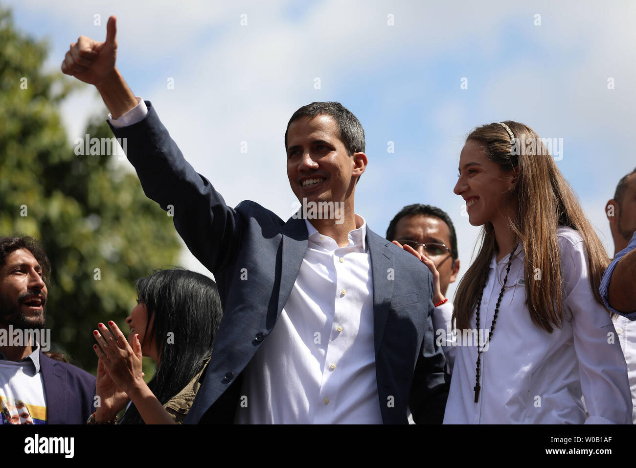 Opposition leader Juan Guaido waves at thousands of supporters during a gathering in Caracas on February 2, 2019.  Venezuelan protesters flowed into the streets of Caracas Saturday, with flags and placards, many to support opposition leader Juan Guaido's calls for democratic elections and others to back embattled President Nicolas Maduro.     Photo by Cristian Hernandez/UPI Stock Photo