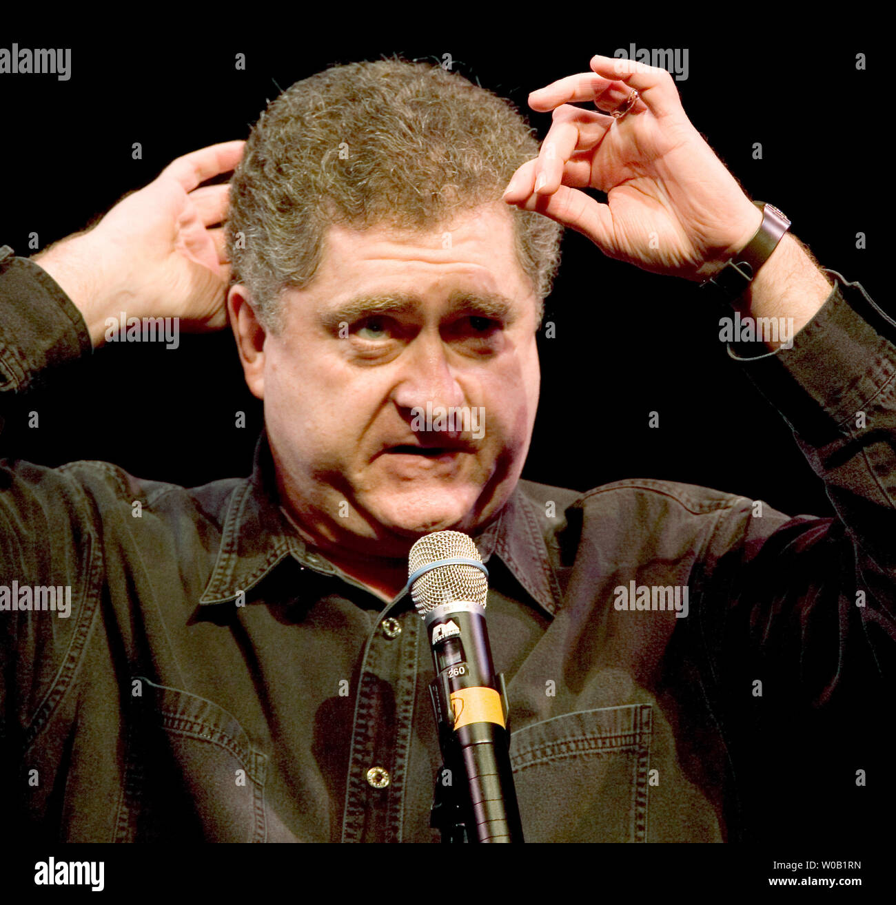 Comedian Mike MacDonald performs during the first of two back-to-back sold out comedy shows hosted by the Trailer Park Boys at the Vogue Theater mainstage during the Vancouver International Comedy Festival, October 22, 2004.   (UPI Photo/Heinz Ruckemann) Stock Photo