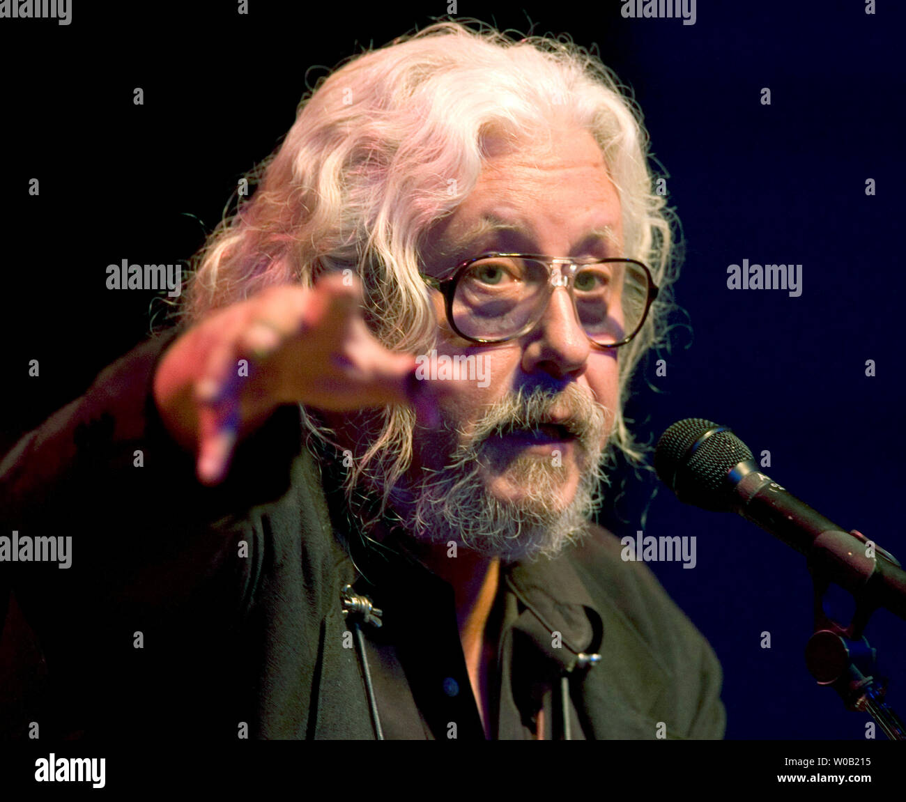 Folk musician Arlo Guthrie, 57, the eldest son of Woody Guthrie, performs to a packed house at Vancouver's University of British Columbia Chan Center Theater , April 19, 2005, the 40th anniversary of the song 'Alice's Restaurant.'   (UPI photo/Heinz Ruckemann ) Stock Photo