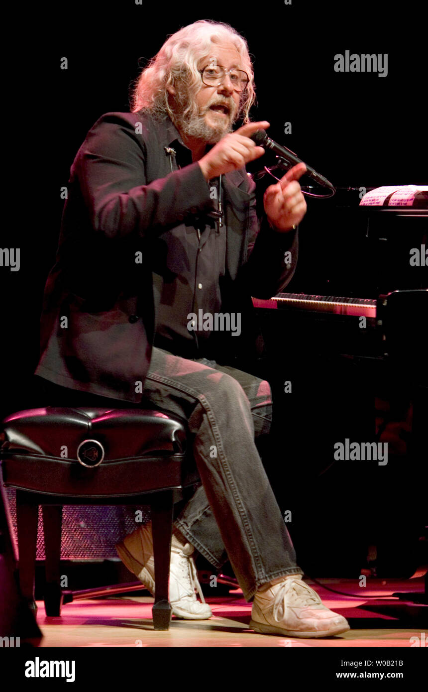 Folk musician Arlo Guthrie, 57, the eldest son of Woody Guthrie, performs to a packed house at Vancouver's University of British Columbia Chan Center Theater , April 19, 2005, the 40th anniversary of the song 'Alice's Restaurant.'   (UPI photo/Heinz Ruckemann ) Stock Photo