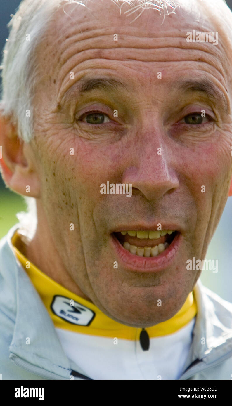 The "voice" of the Tour de France, Phil Liggett (center), joins Lance