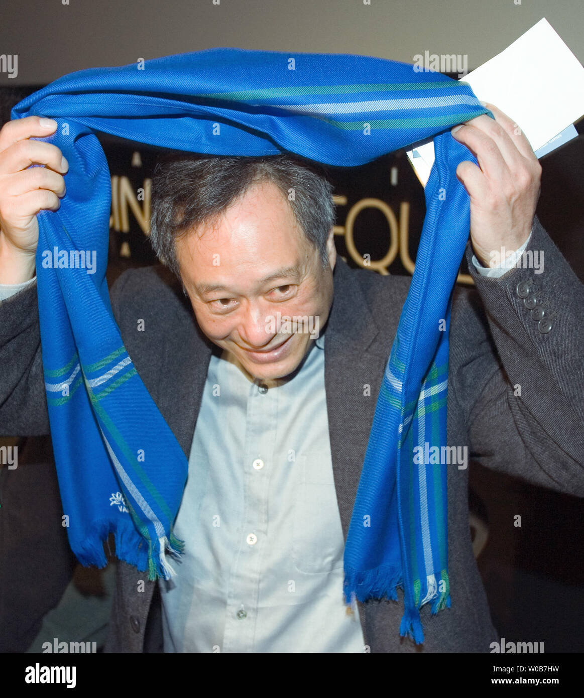Oscar winning director Ang Lee receives a 2010 VANOC Winter Olympic scarf after speaking to local film school students and Hollywood North film industry people in Vancouver, British Columbia, April 19, 2008.    (UPI Photo/Heinz Ruckemann) Stock Photo