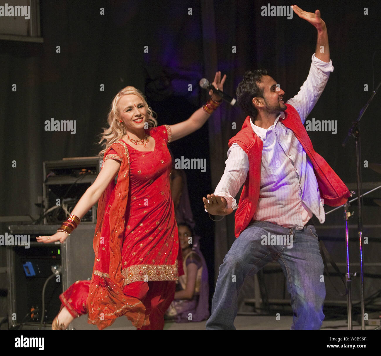 Singer and theatre performer Anita Lerche (L.) from Denmark includes  "Passport" from her album "Heer from Denmark" as she sings several songs in  Punjabi during the 2010 Vancouver International Bhangra Celebration at