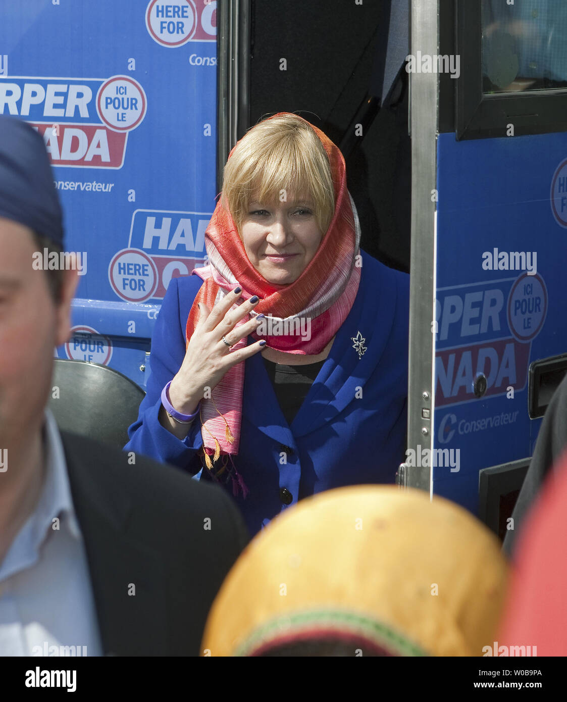 Laureen, the wife of Canada's Conservative Prime Minister Stephen Harper  gets off the campaign bus to join her husband as they visit Vaisaikhi  celebrations on a 2011 Federal Election Campaign stop in