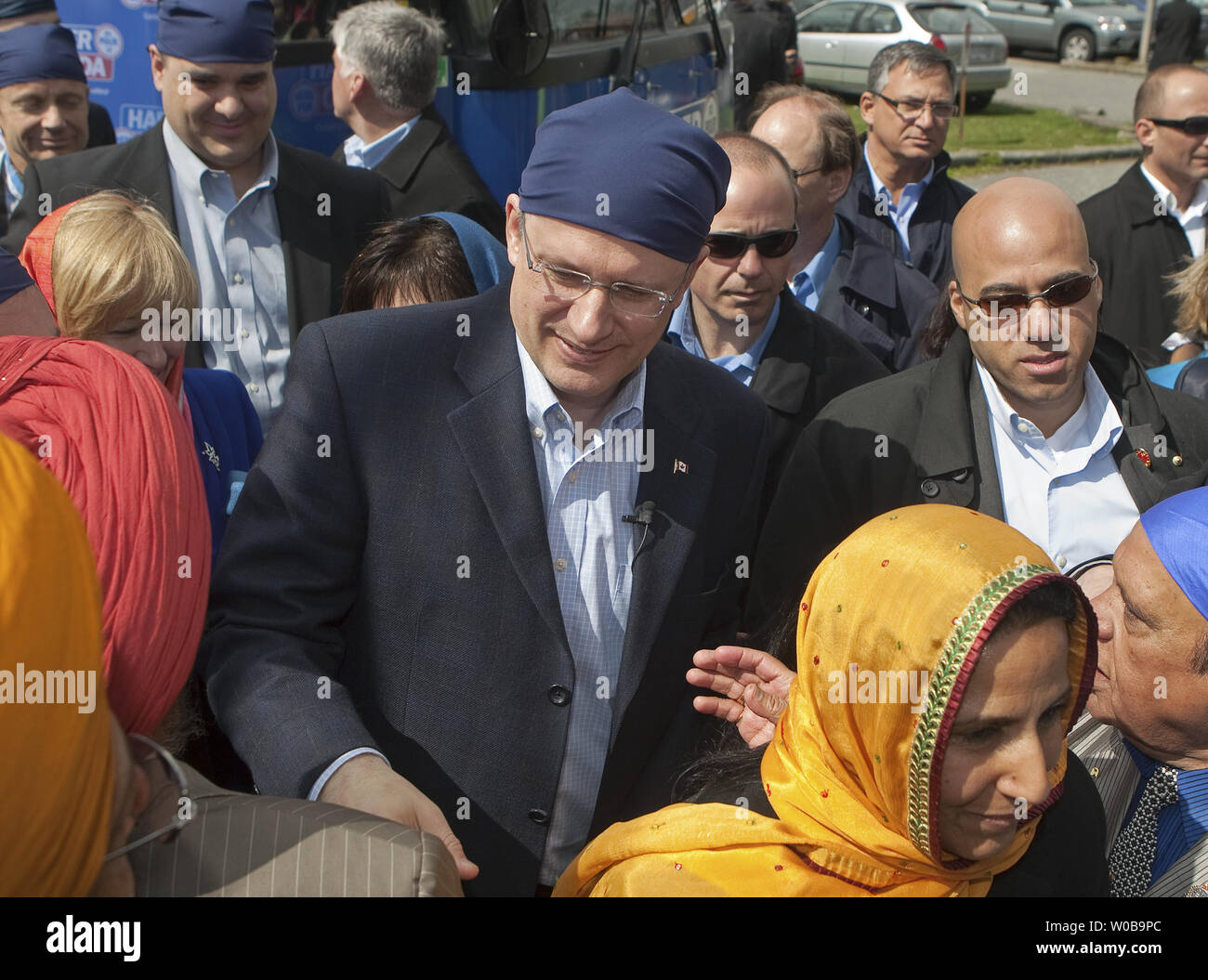 Laureen, the wife of Canada's Conservative Prime Minister Stephen Harper  gets off the campaign bus to join her husband as they visit Vaisaikhi  celebrations on a 2011 Federal Election Campaign stop in