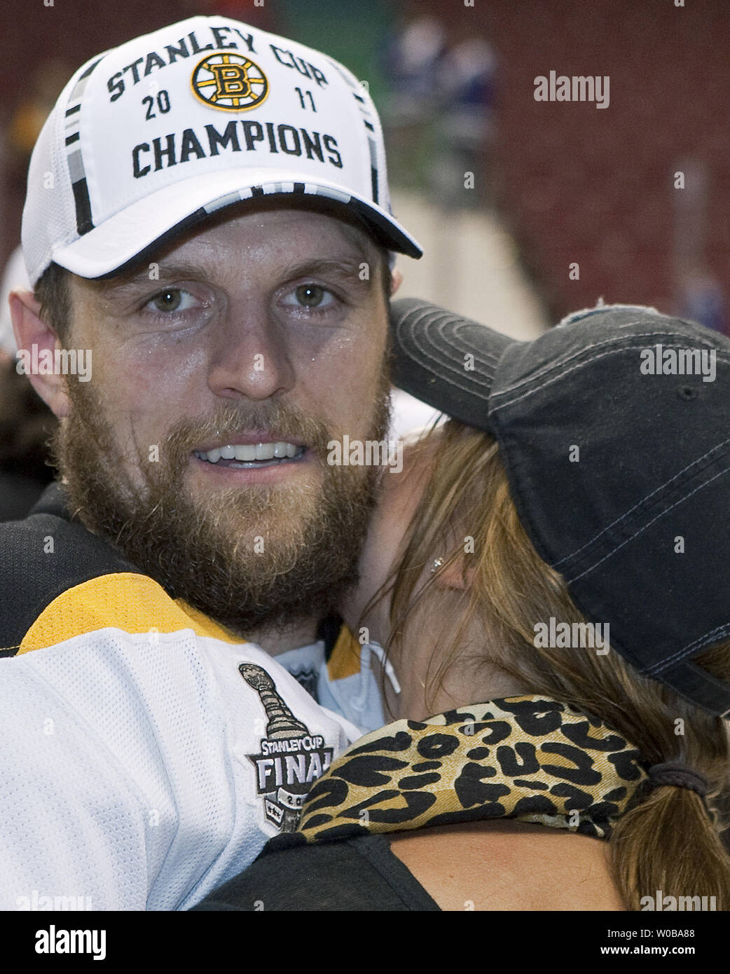 Boston Bruins Dennis Seidenberg hugs 